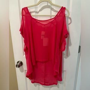 Woman’s brand new with tags too. Color is watermelon. Flowy